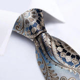 Decorative tie with intricate patterns on a white background