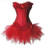 Red corset dress with ruffled lace trim and tulle tutu skirt. Features satin bows, evoking elegance and playfulness. Bright and festive tone.