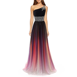 A womanwearing a colorful evening gown with a gradient from black to purple to pink. The one-shoulder design and patterned waist add elegance.