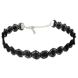 Black lace choker with intricate floral design and silver chain clasp, set against a white background, conveying elegance and a vintage feel.