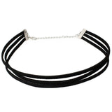 Black velvet choker featuring three strands and a silver adjustable chain clasp. The look is minimalist and elegant, conveying a modern, stylish tone.