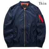 Dark blue bomber jacket with a front zipper, orange inner lining, and red ribbon on the left sleeve. The word "Thin" is in the upper right corner.