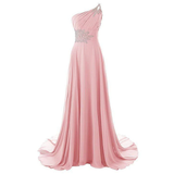 Elegant one-shoulder pink gown with flowing floor-length skirt. Features intricate silver embellishments on the shoulder and waist, exuding sophistication.
