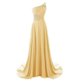 Elegant one-shoulder yellow gown with flowing skirt and intricate floral lace detail on the bodice. The design exudes grace and sophistication.