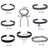 A display of eight black chokers on a white background. Designs include lace, velvet, floral, and a cord with a bow. Sizes vary between 32+7 cm and 160 cm, with some featuring pendants like a Yin Yang and a triangle.